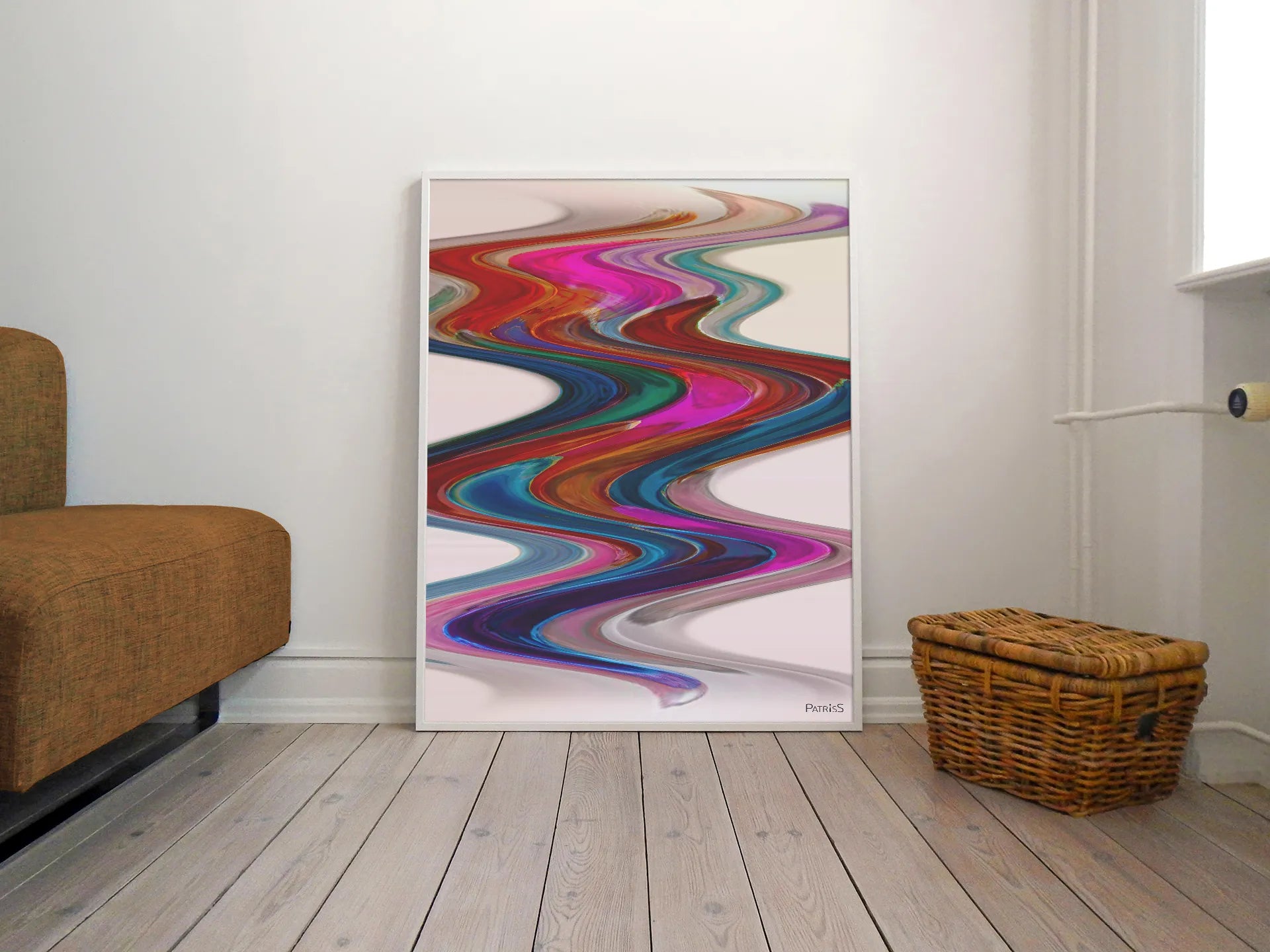 New Wave, Wooden Framed Poster by PatrisS, leaning against a wall on the wood floor, between a brown sofa and a wicker basket.